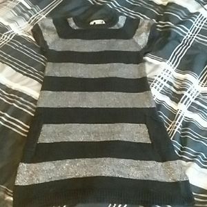 A knitted half dress with pockets